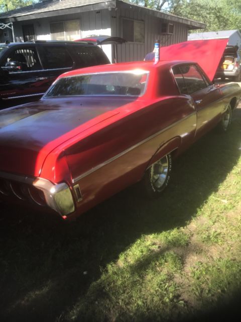 1968 Red Chevrolet Impala Coupe