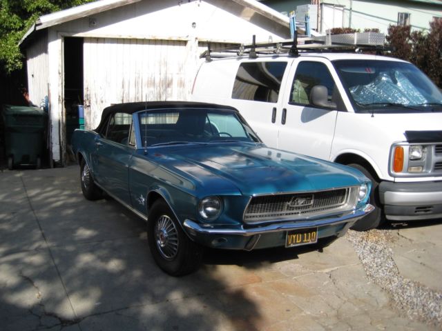1968 turquoise Ford Mustang Convertible