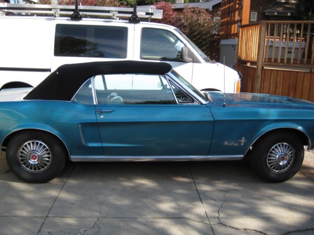 1968 turquoise Ford Mustang Convertible