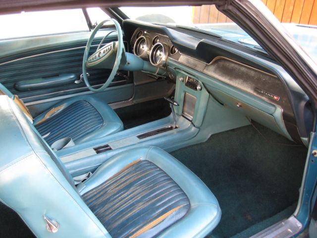 1968 turquoise Ford Mustang Convertible