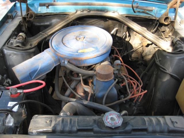 1968 turquoise Ford Mustang Convertible