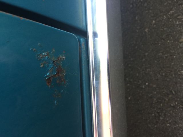 1968 turquoise Ford Mustang Convertible