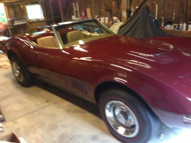 1968 maroon Chevrolet Corvette Convertible