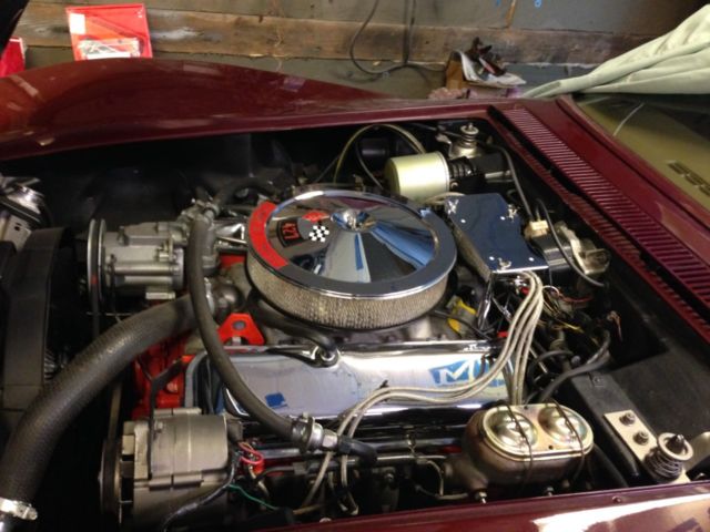 1968 maroon Chevrolet Corvette Convertible