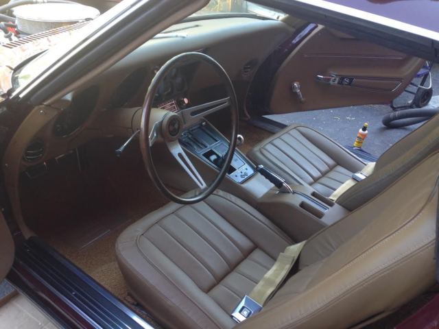 1968 maroon Chevrolet Corvette Convertible