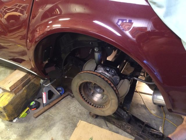 1968 maroon Chevrolet Corvette Convertible