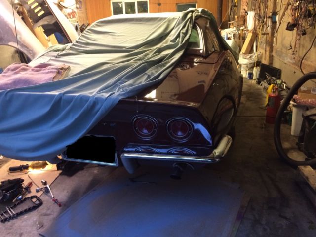 1968 maroon Chevrolet Corvette Convertible