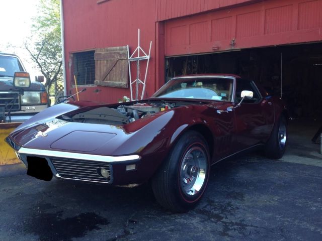 1968 maroon Chevrolet Corvette Convertible