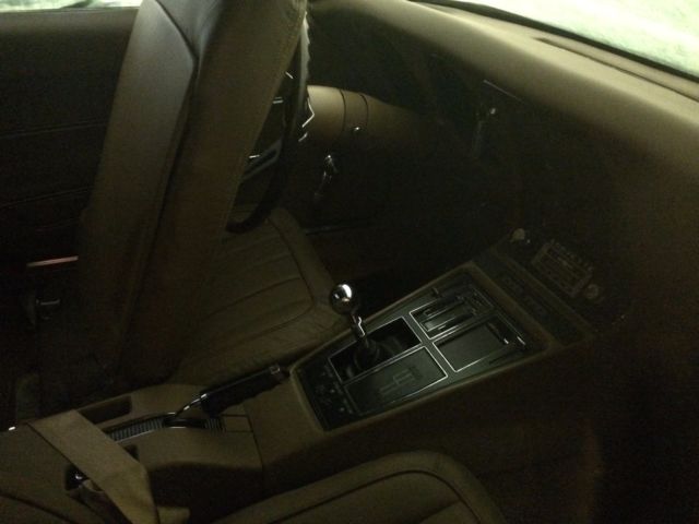 1968 maroon Chevrolet Corvette Convertible