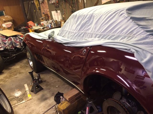 1968 maroon Chevrolet Corvette Convertible