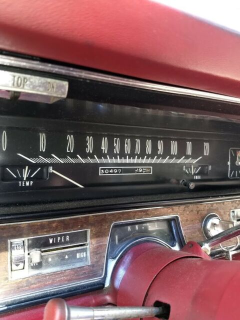 1968 Red Cadillac DeVille Convertible