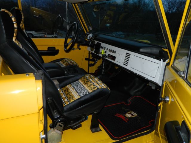 1968 Corvette competition yellow Ford Bronco