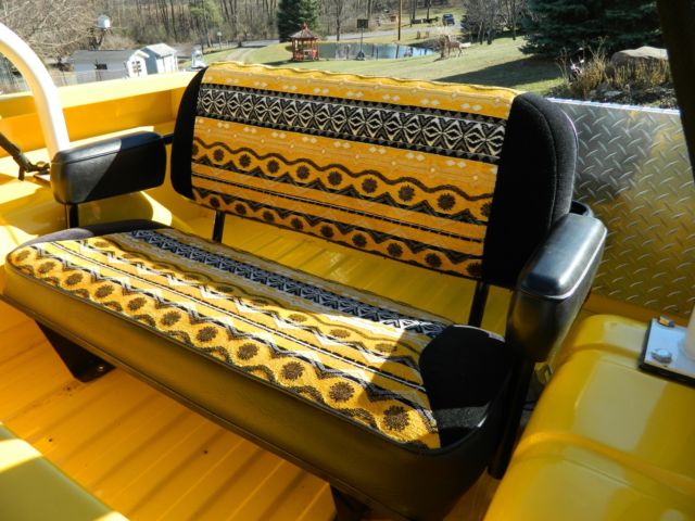 1968 Corvette competition yellow Ford Bronco