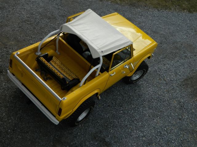 1968 Corvette competition yellow Ford Bronco