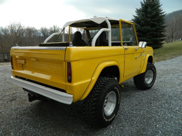 1968 Corvette competition yellow Ford Bronco