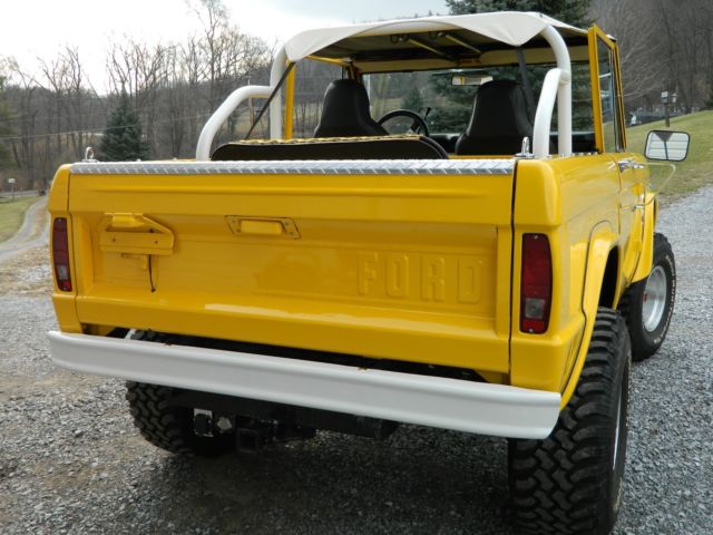 1968 Corvette competition yellow Ford Bronco