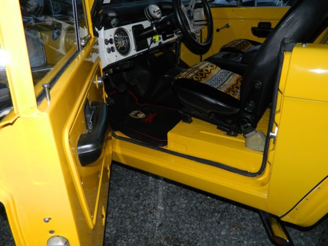 1968 Corvette competition yellow Ford Bronco