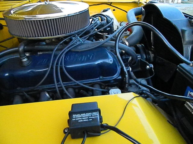 1968 Corvette competition yellow Ford Bronco