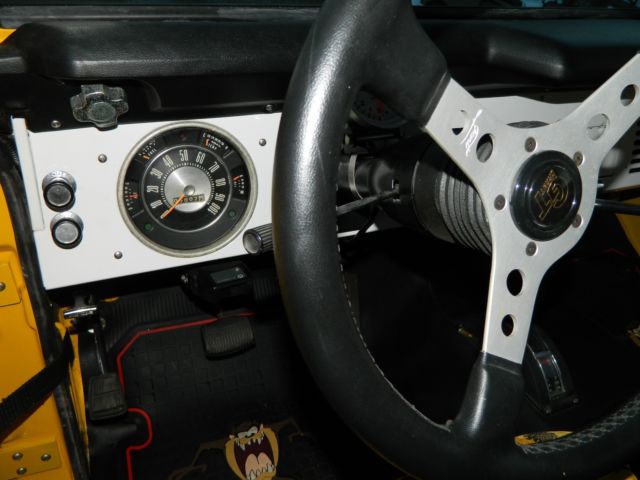 1968 Corvette competition yellow Ford Bronco