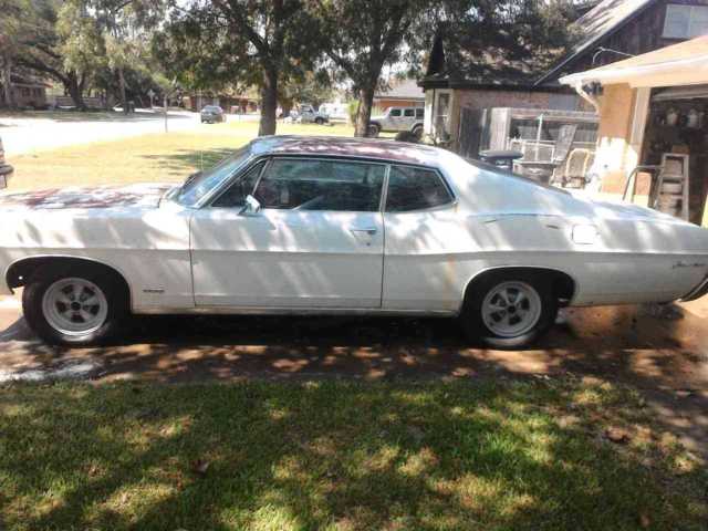 1968 yellow Ford Galaxie Fastback