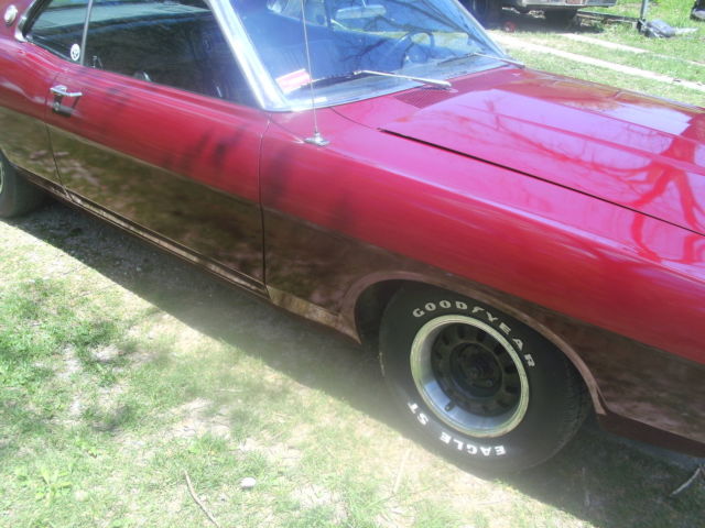 1968 Burgundy Ford Torino