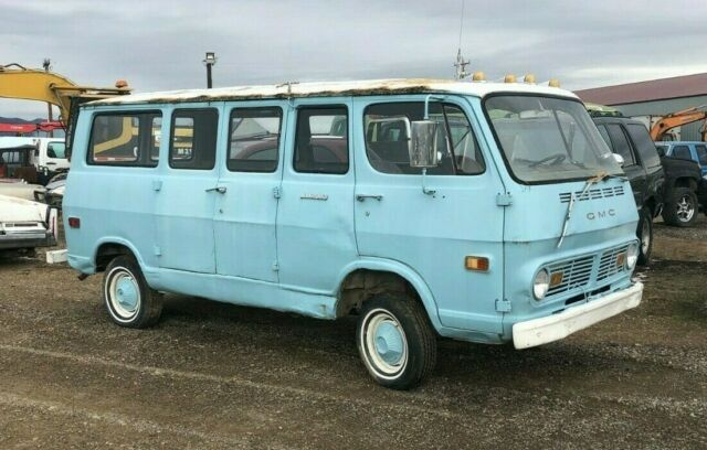 1968 blue GMC Handibus Extended Passenger Van