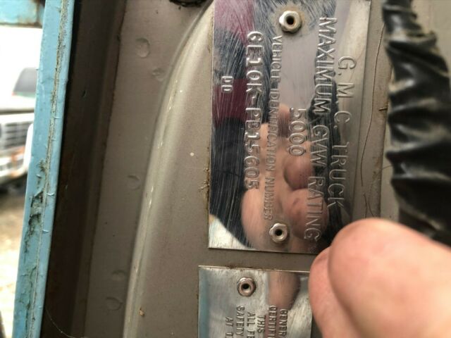 1968 blue GMC Handibus Extended Passenger Van