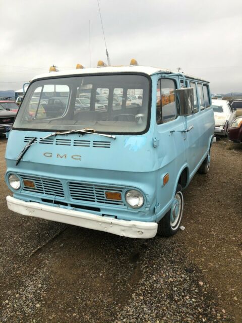1968 blue GMC Handibus Extended Passenger Van