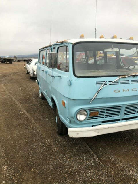 1968 blue GMC Handibus Extended Passenger Van