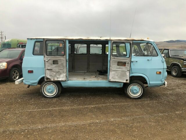 1968 blue GMC Handibus Extended Passenger Van