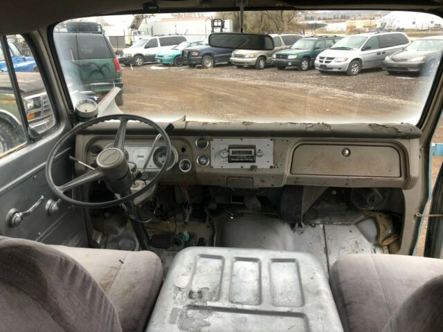 1968 blue GMC Handibus Extended Passenger Van