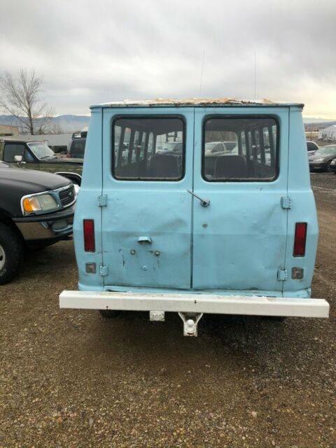 1968 blue GMC Handibus Extended Passenger Van
