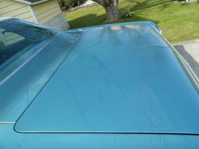 1968 Turqouise Chevrolet Impala Sedan