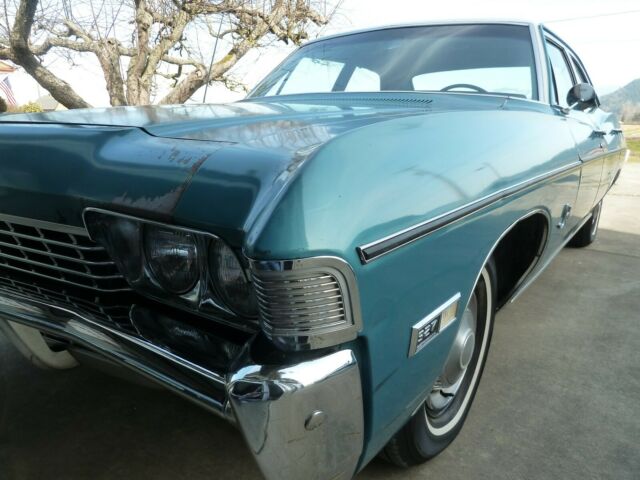 1968 Turqouise Chevrolet Impala Sedan