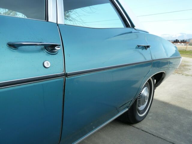 1968 Turqouise Chevrolet Impala Sedan