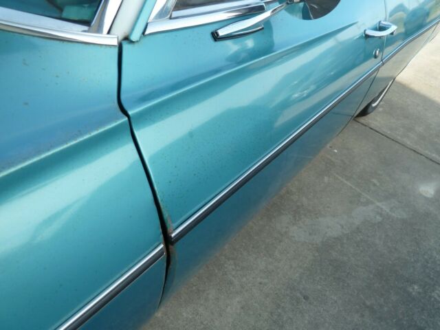 1968 Turqouise Chevrolet Impala Sedan