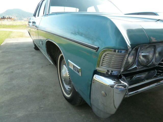 1968 Turqouise Chevrolet Impala Sedan