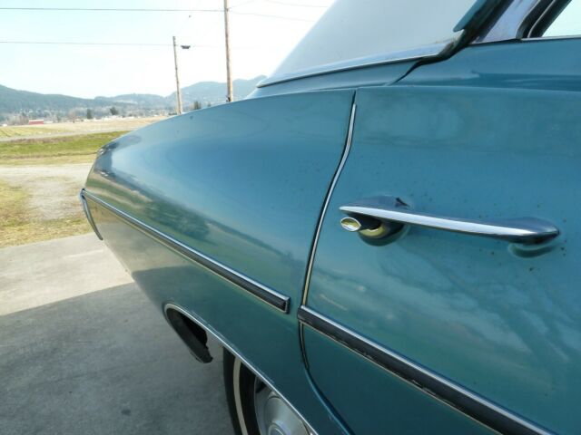 1968 Turqouise Chevrolet Impala Sedan