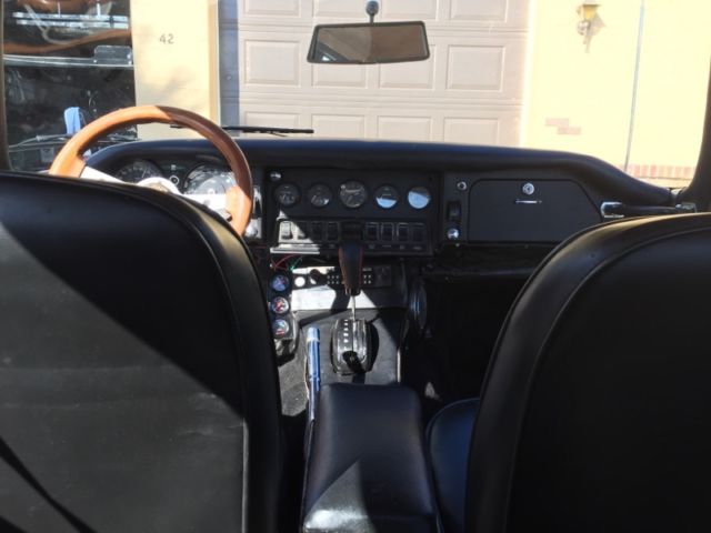 1968 Magenta Jaguar E-Type Coupe