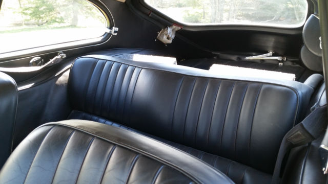 1968 Burgundy Jaguar E-Type 2+2 Coupe