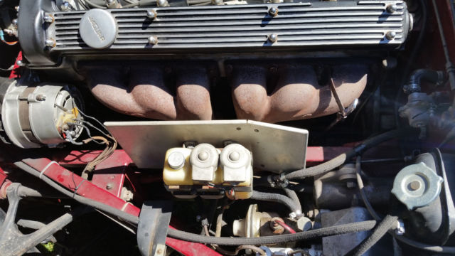 1968 Burgundy Jaguar E-Type 2+2 Coupe