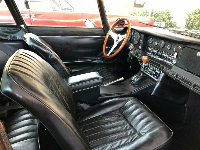 1968 Burgundy Jaguar E-Type Coupe