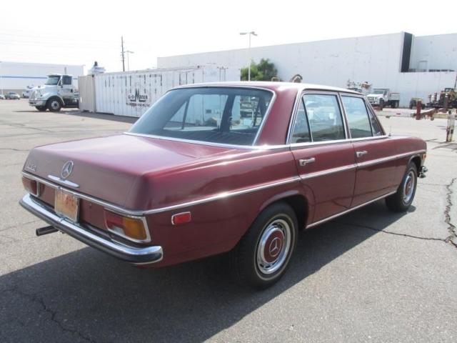 1968 Red Mercedes-Benz 200-Series Sedan