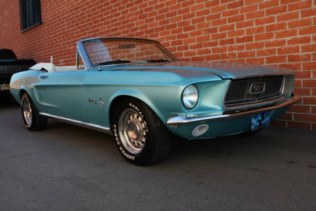 1968 green Ford Mustang Convertible