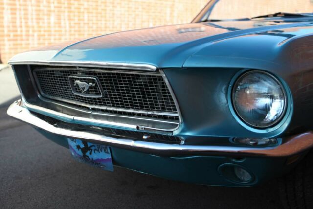 1968 green Ford Mustang Convertible