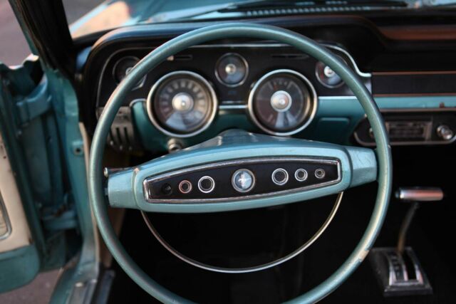 1968 green Ford Mustang Convertible