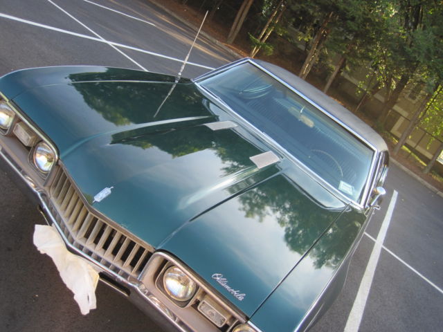 1968 Green Oldsmobile Cutlass Coupe
