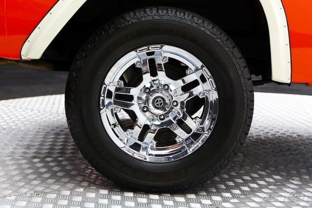 1968 Orange Ford Bronco Pickup Truck