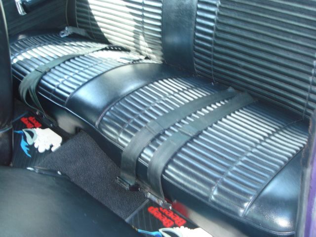 1969 plum Plymouth Road Runner Coupe