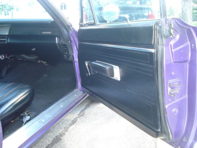 1969 plum Plymouth Road Runner Coupe